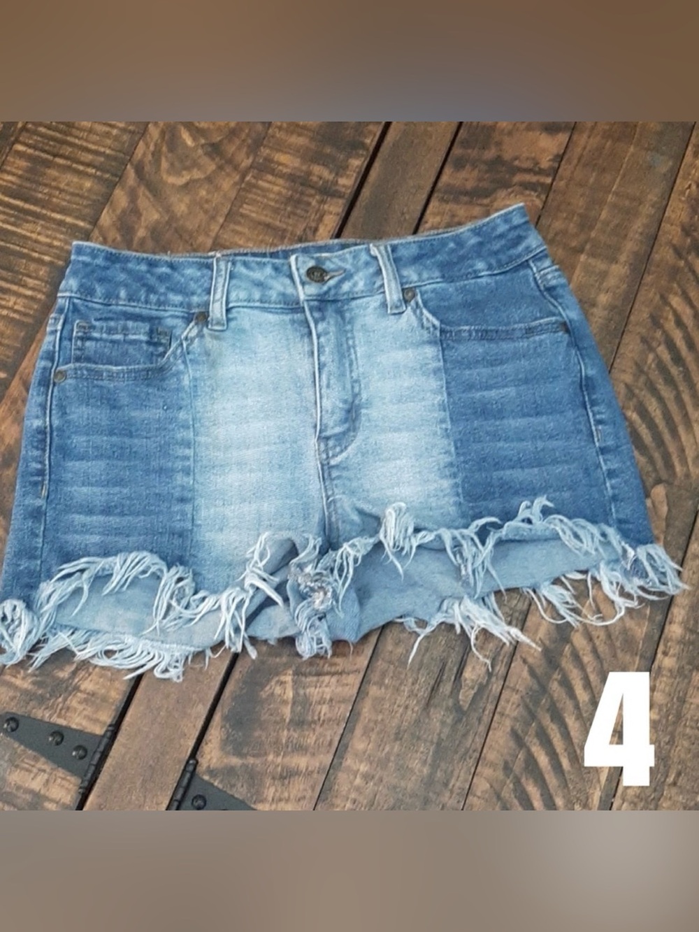 Altar'd state fringe jean shorts.
